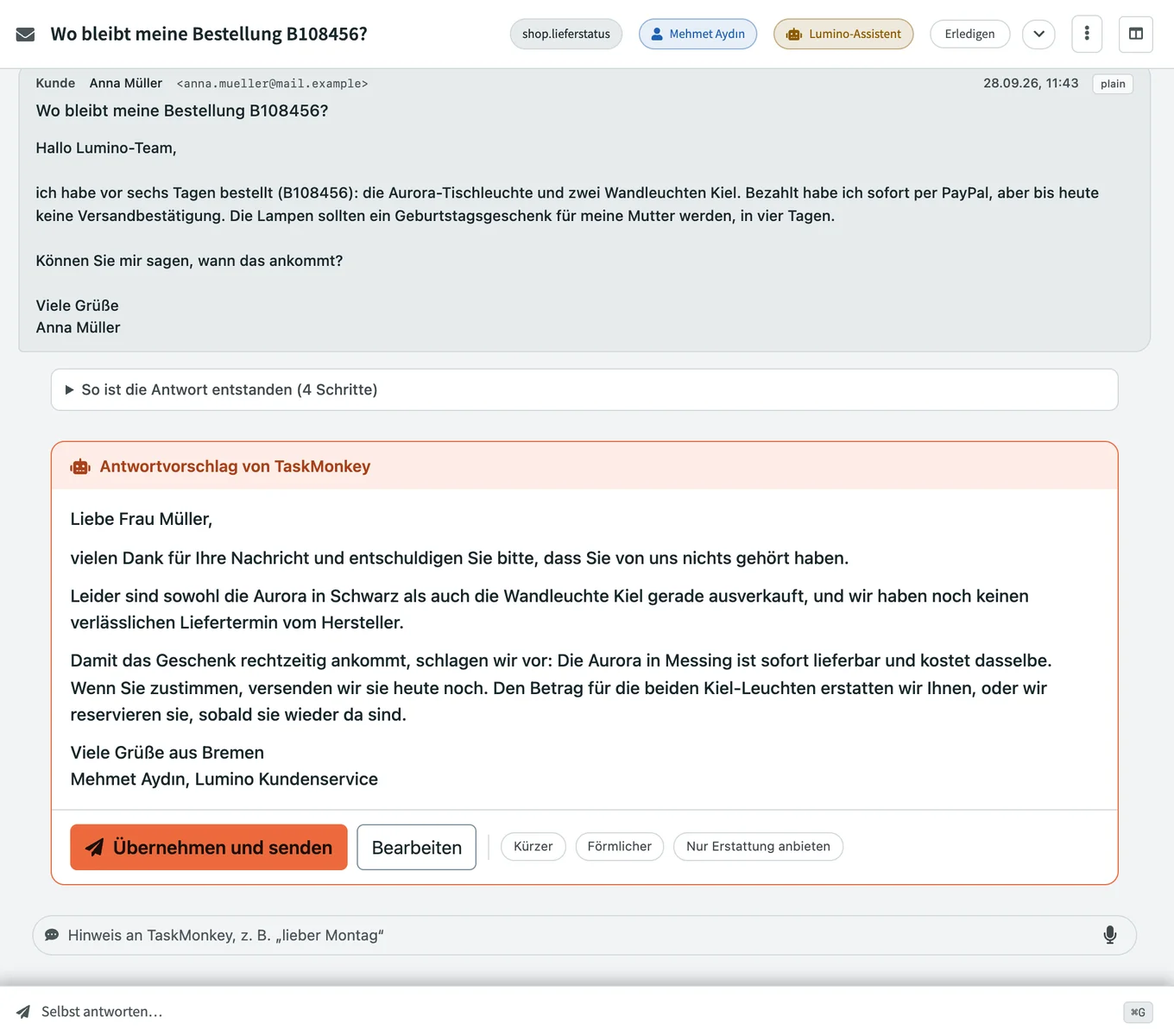 TaskMonkey-Posteingang: Kundenmail zu einer verspäteten Bestellung, darunter ein fertiger Antwortvorschlag mit dem Knopf „Übernehmen und senden“.